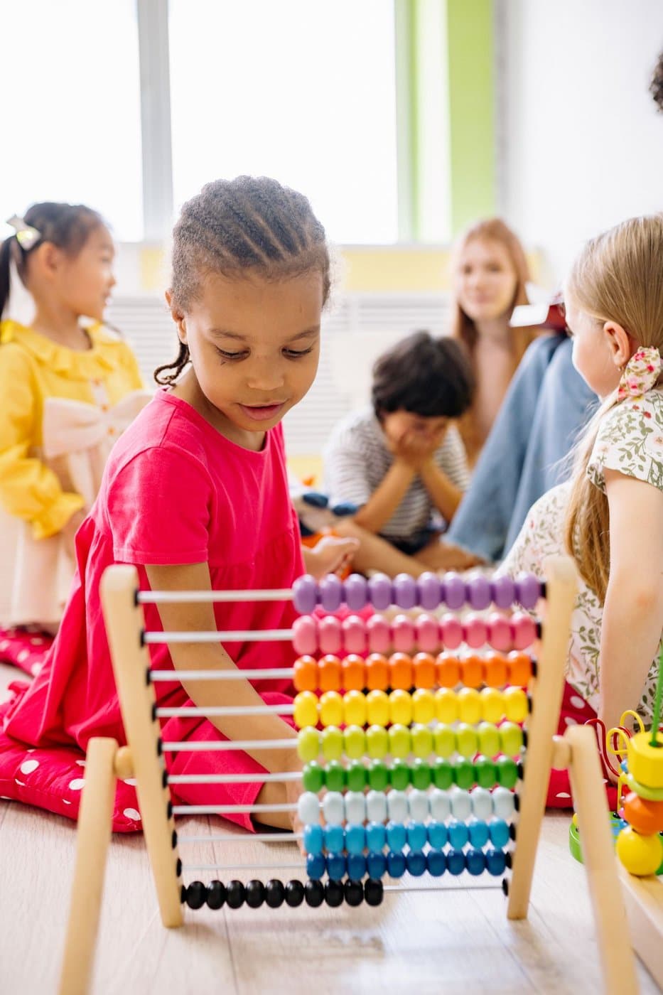 Children learning together in a bright preschool classroom