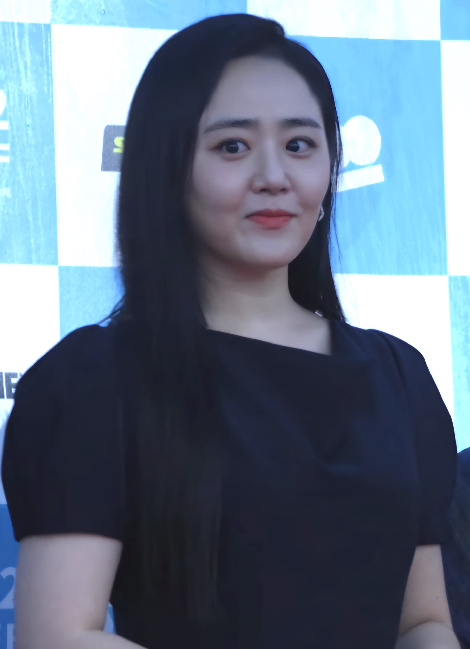 Actress Moon Geun-young on a festival red carpet in a black gown