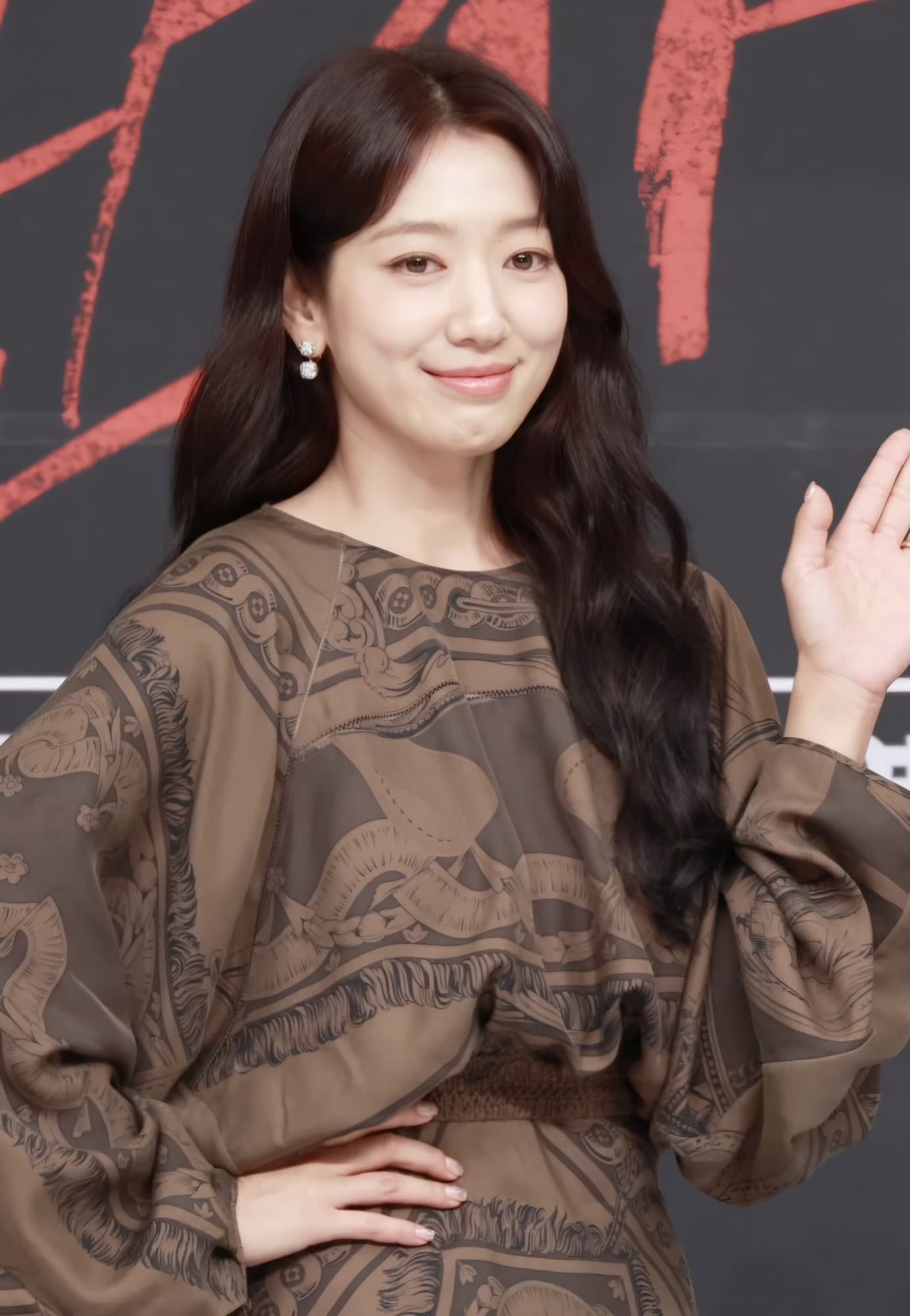 Park Shin-hye smiling and waving at the Judge from Hell press conference in September 2024